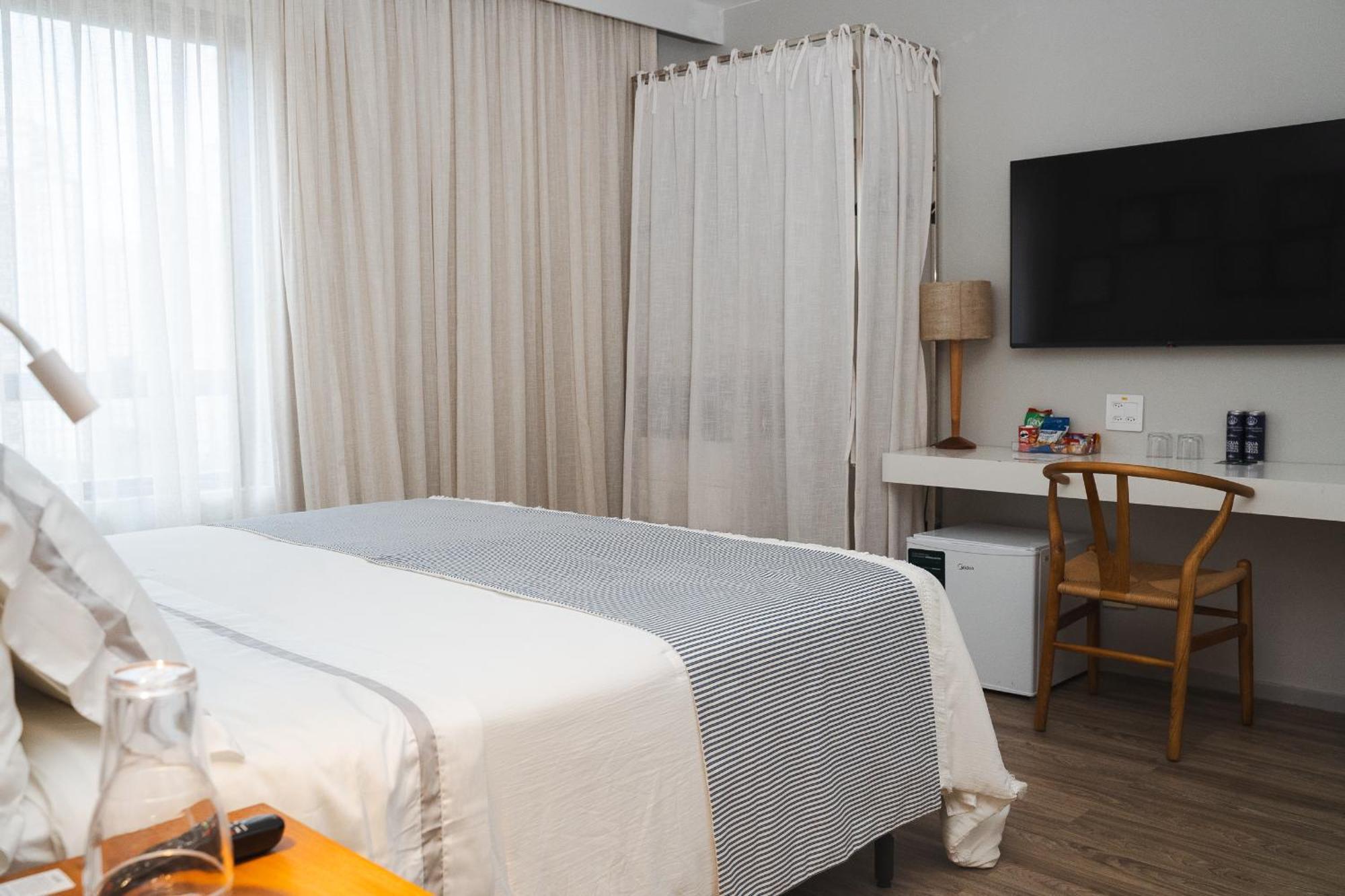 Hotel Radisson Rio De Janeiro Barra Pokoj fotografie A room at the hotel